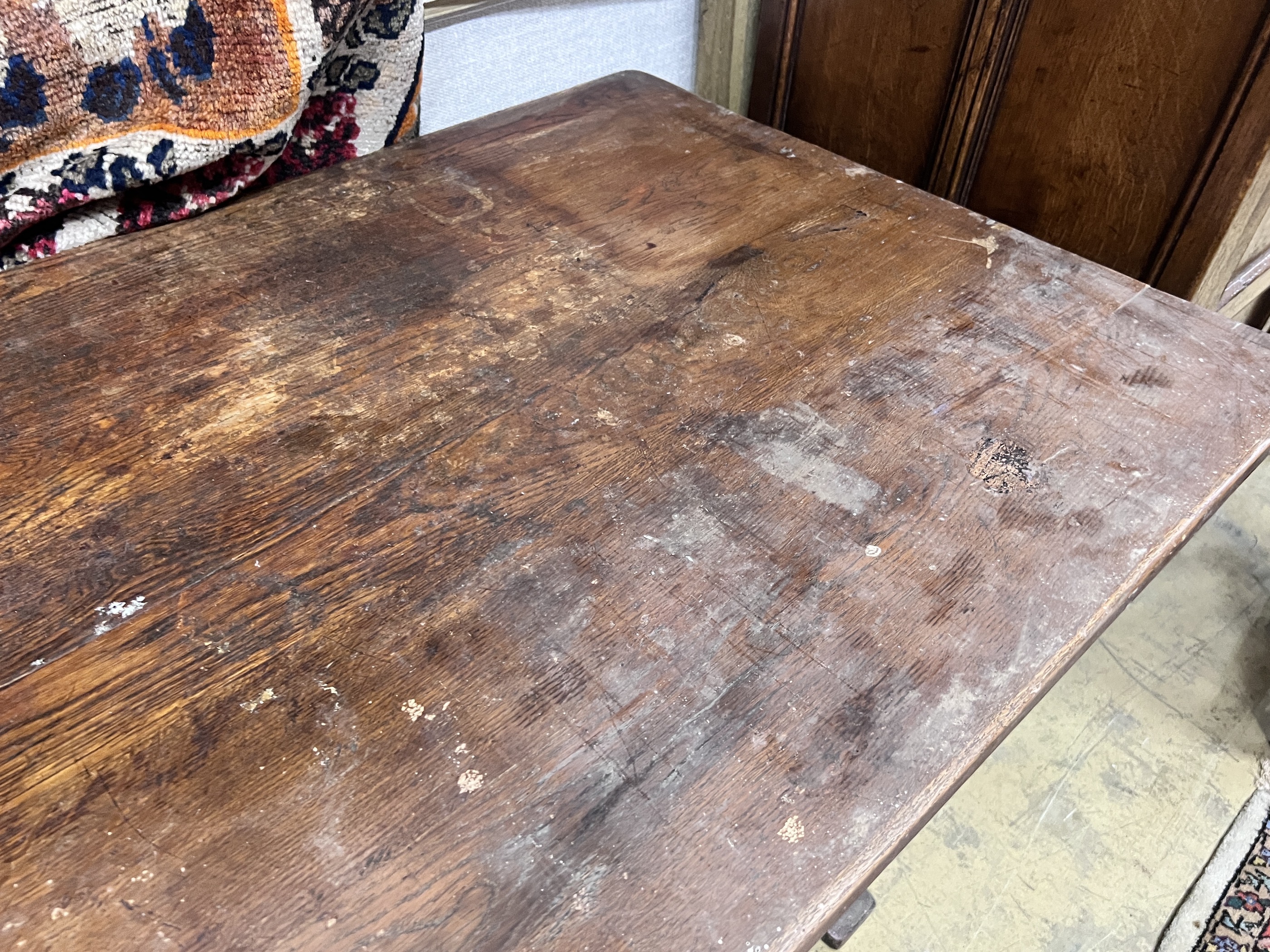 A 1920's rectangular oak dining table, length 145cm, depth 74cm, height 76cm